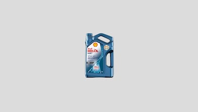 Bidón Shell Helix HX7 10W40 con fondo gris.